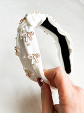 Load image into Gallery viewer, Girlie pop bow headband on white
