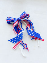 Load image into Gallery viewer, Stars + Stripes Longtail Yarn Bow
