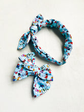 Load image into Gallery viewer, Frosty on Blue Headband
