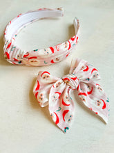 Load image into Gallery viewer, Blushing Kris Kringle Headband
